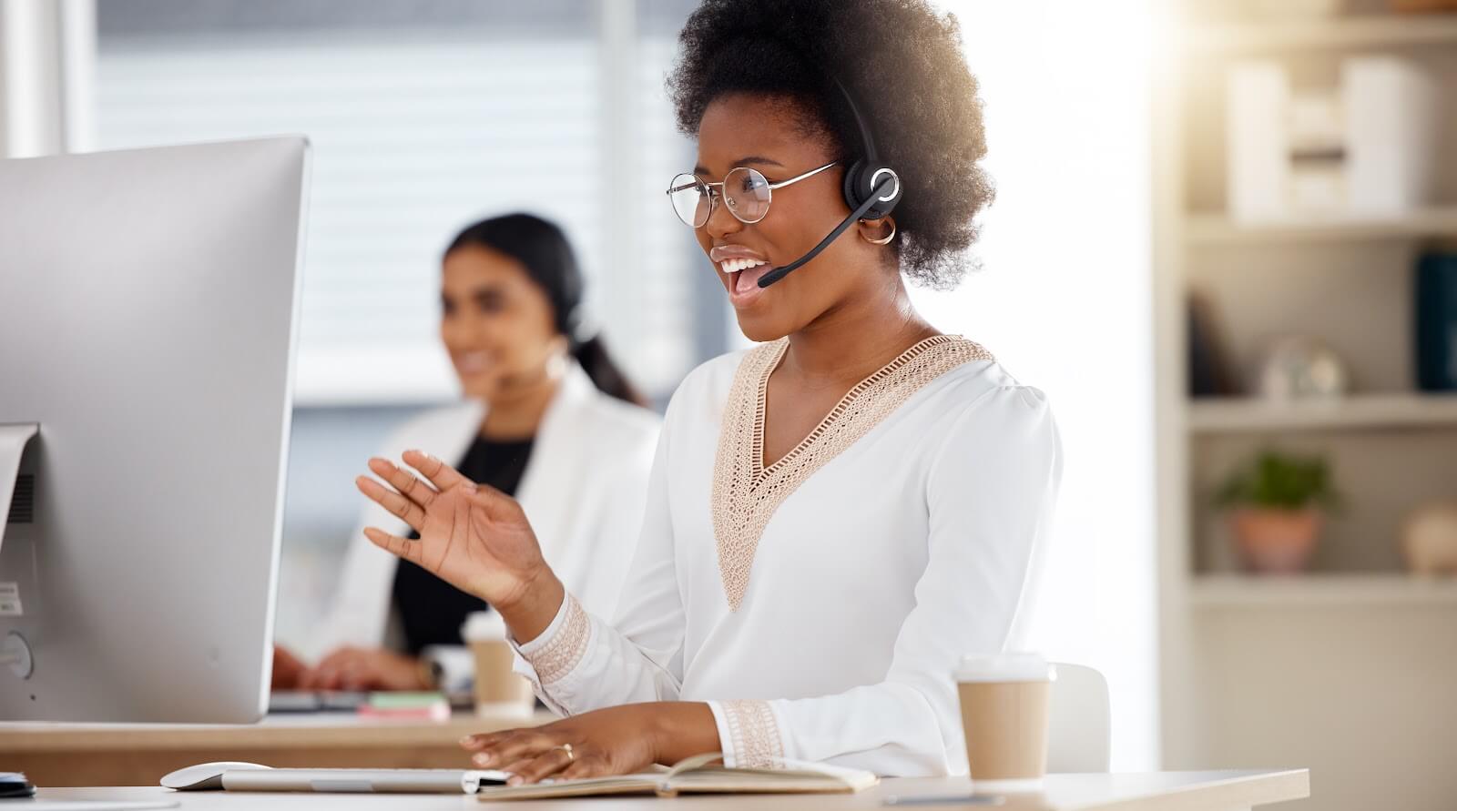 Cloud contact center support agent with headset.