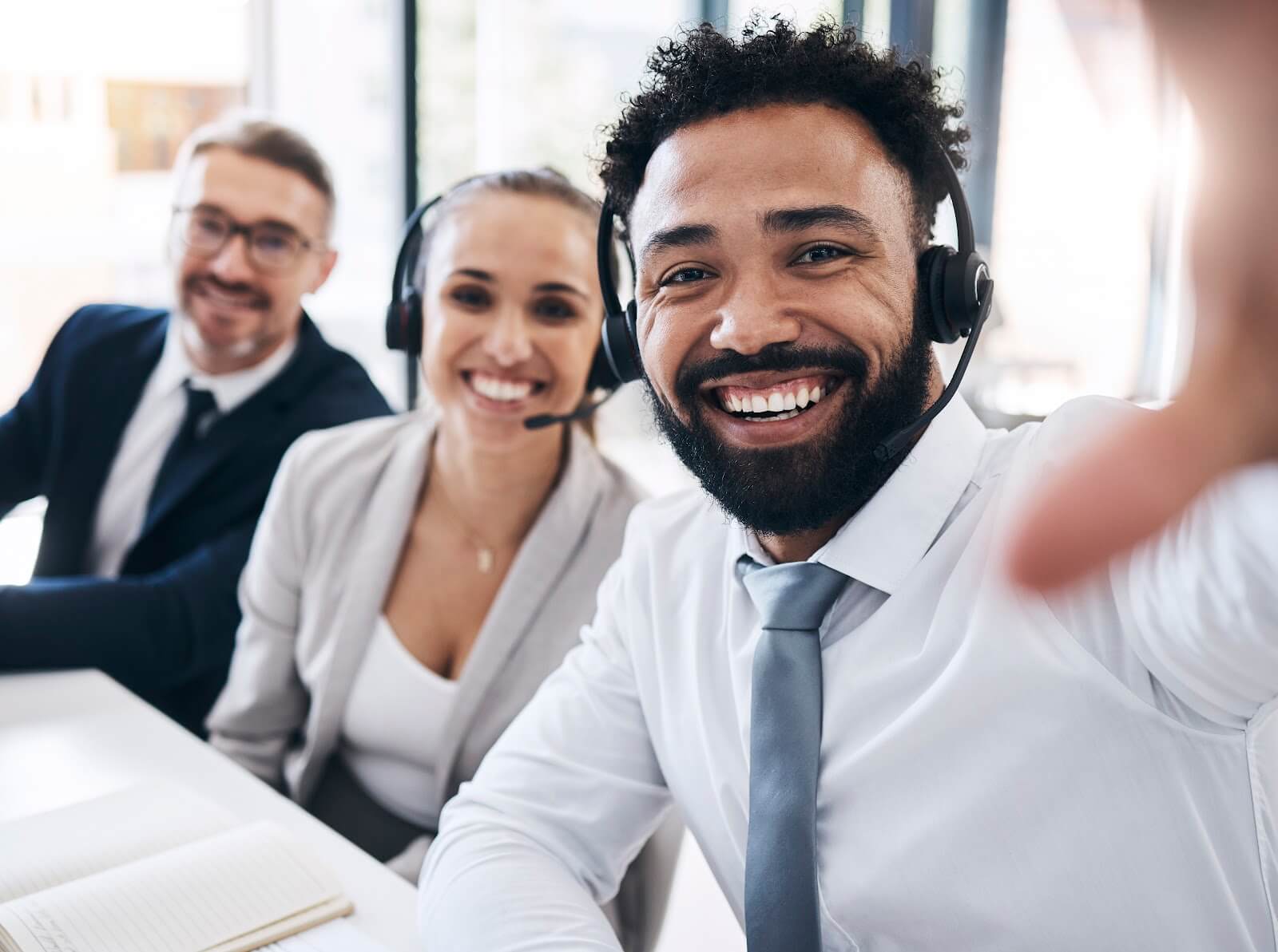 VoIP customer support team on headsets